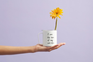 Flower-mug Person holding a mug with a flower